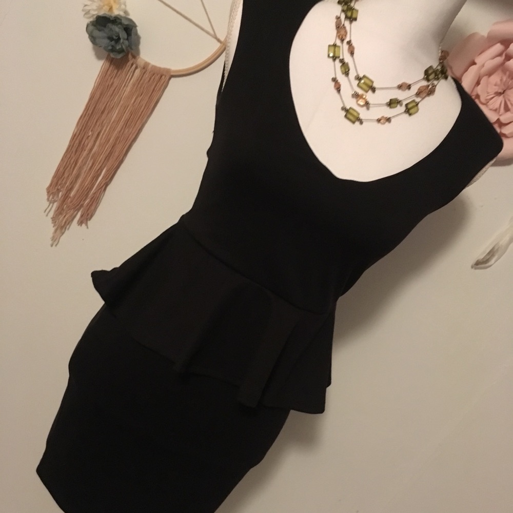 The Perfect Black Mini Dress With Opened Back!